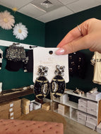 Black & gold football earrings