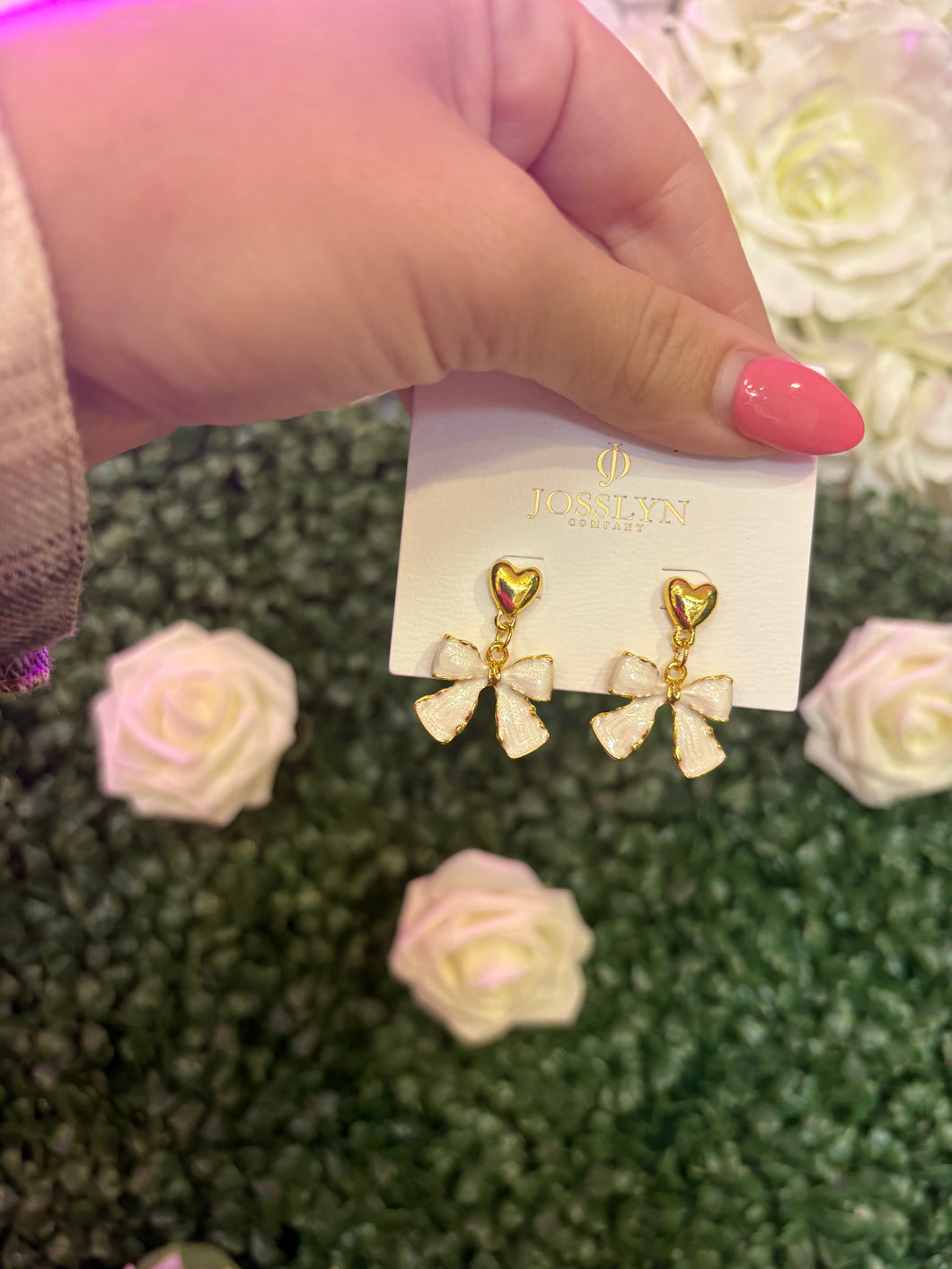 Bow gold earrings