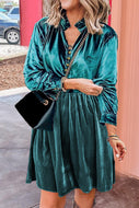 Emerald green velvet dress